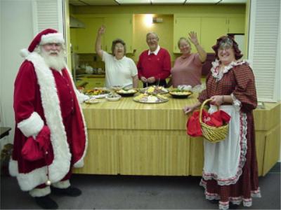 Santa and Mrs. Claus seem to approve of the party fare...