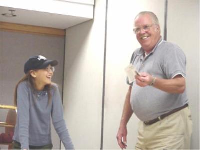 Coin club junior Kimberly Klein and coin auctioneer Bob Vick