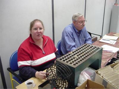 Coin club officers helping and enjoying the benefit of coin club membership